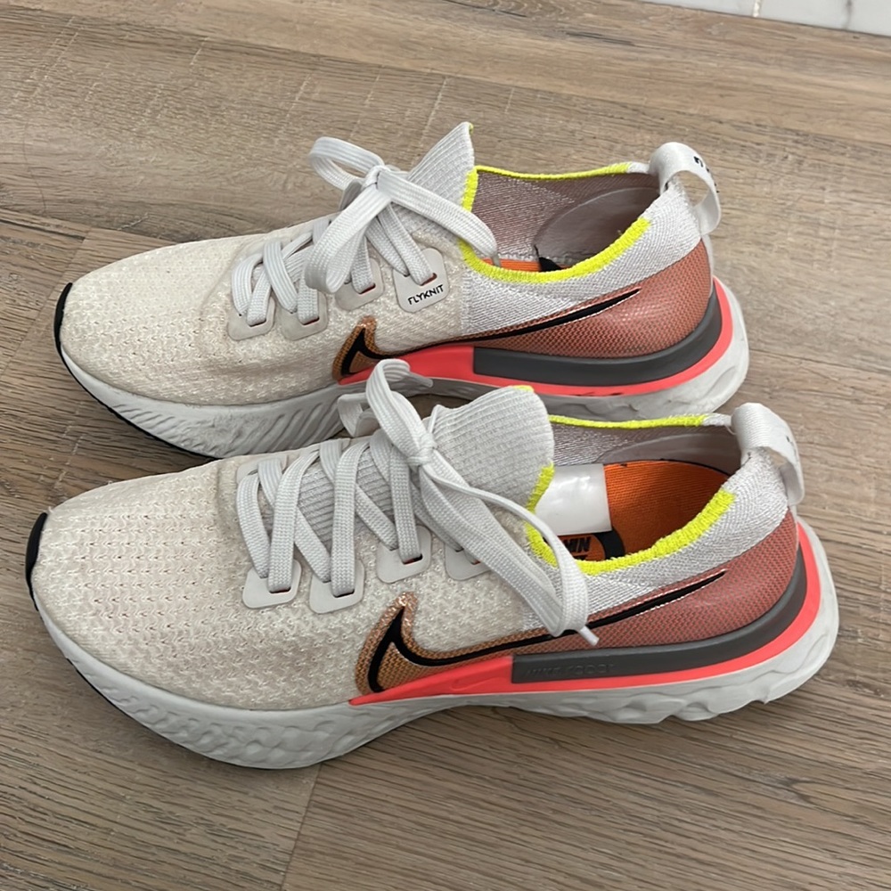 Nike Women’s White and Coral Running Shoes